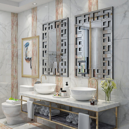 Grand miroir mural décoratif avec cadre géométrique aux accents argentés