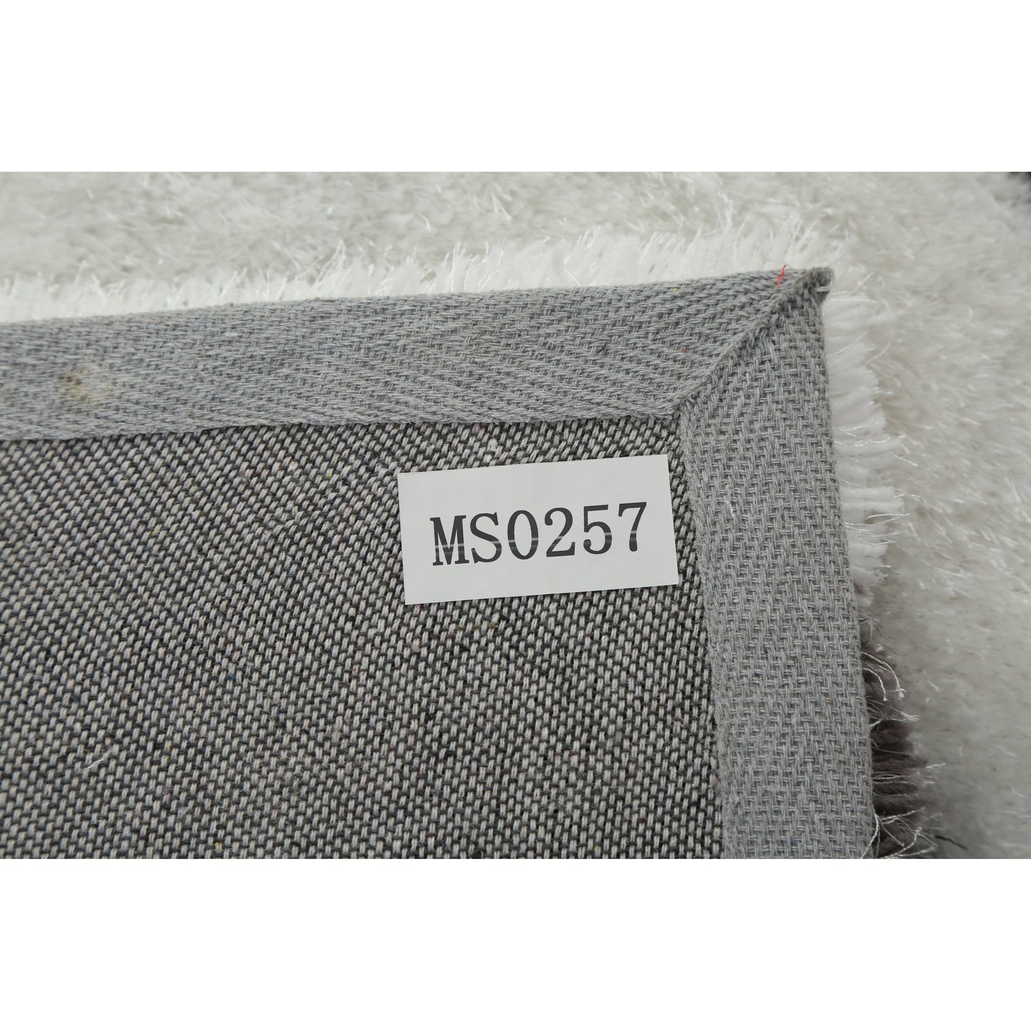 Tapis à poils longs Mateos au design abstrait